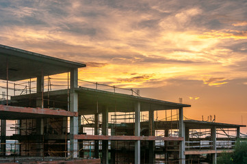 Unfinished and abandoned floor construction at sunset