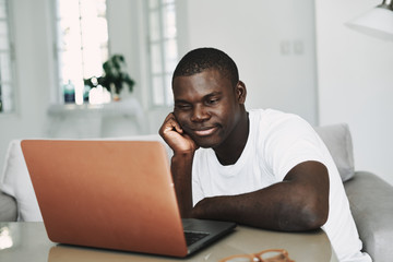 male african appearance laptop rest