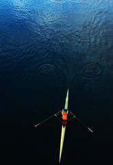Top down view of a rower on a river. © Andy Left
