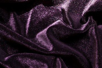 Velvet background. Velvet is purple plum color. Beautiful fabric Abstract