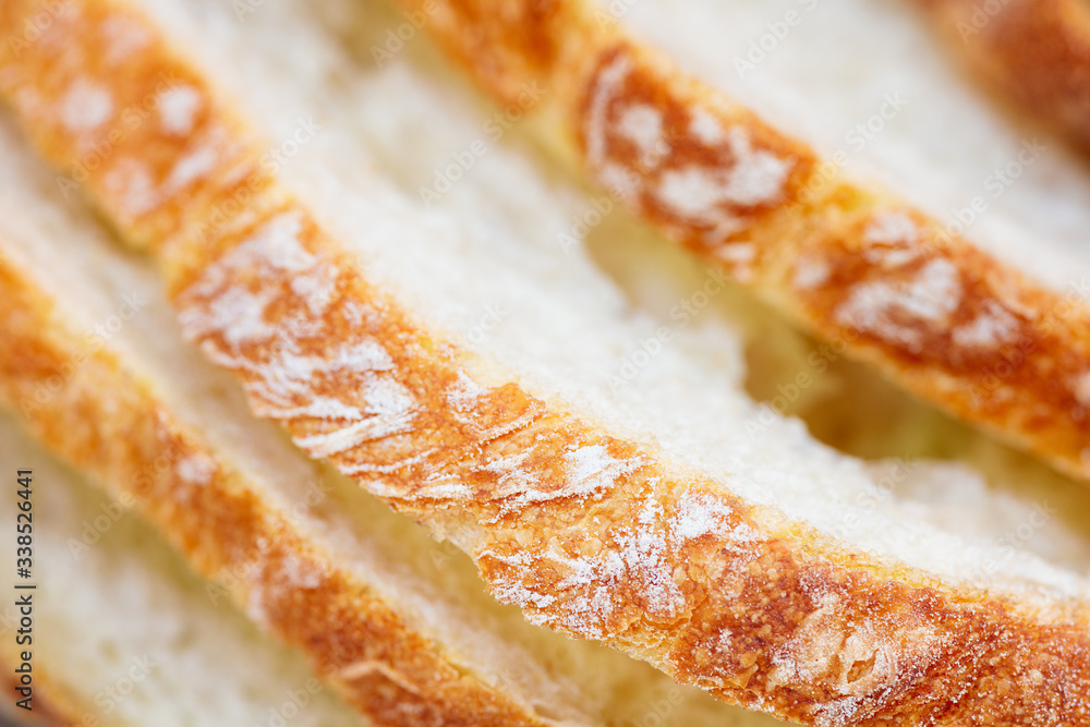 Poster bakery concept. fresh fragrant sliced bread close-up
