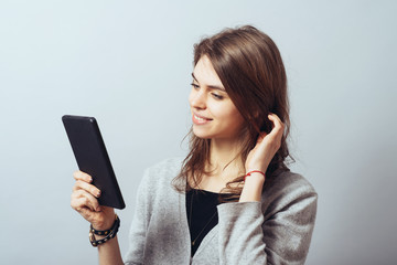 young woman using digital tablet computer