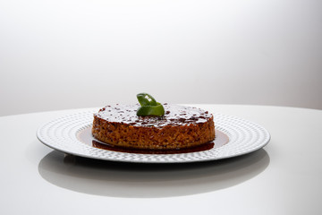 Quesillo Flan Creme Caramel  on white plate white background