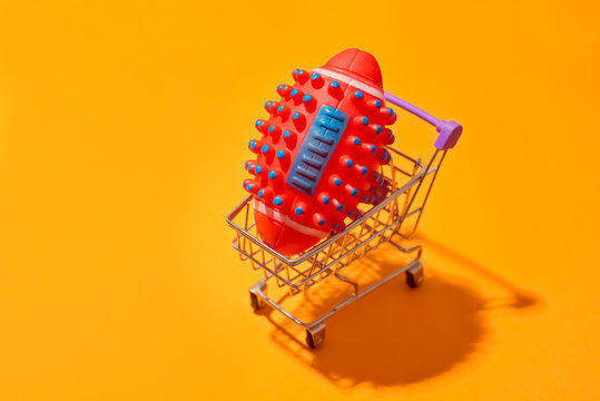 American football ball inside shopping cart. Ball like virus