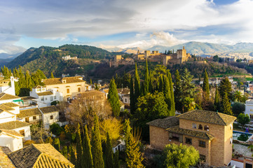 Granada, Spain - February 11th, 2019 :  Alhambra palace and overhead of the Unesco listed Albaicin quarter.