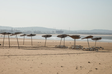 umbrellas on an empty beach