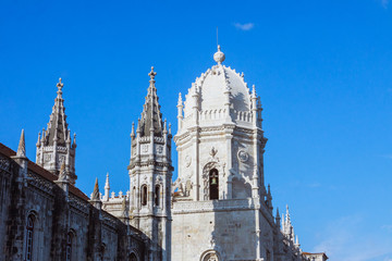 Fototapeta na wymiar Lisbon, Portugal - May, 25th, 2018 : Jeronimos Monastery one of the most prominent examples of the Portuguese Late Gothic Manueline style.