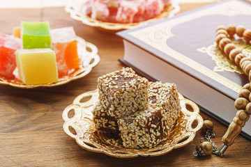 Turkish delight sweets on a metal oriental plate close up