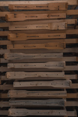 frames for bee hives, wooden items for beekeeping, wooden frames are stacked, a lot