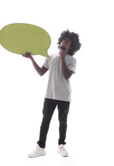 in full growth. curly-haired guy holding a speech bubble