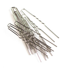 beautiful gold hairpins, stars, various hair decorations isolated on a white background. accessories for handmade jewelry