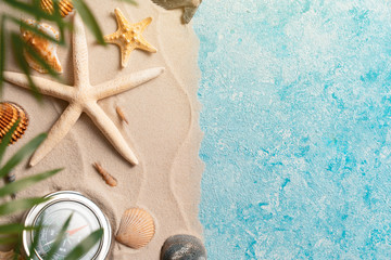 summer beach background with shell sea star compas blurred Palm vacation and travel concept, Flat lay top view copy space Minimal exotic concept. Creative layout of sand waves and sea © velishchuk