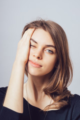 depressed girl on a gray background