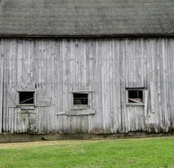 weathered wooden farm building 
