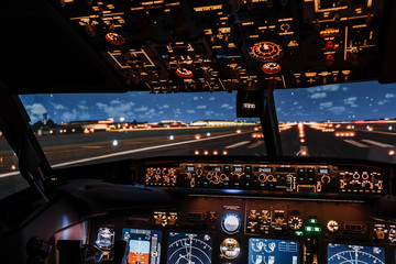 View on airport from modern Boeing aircraft before take-off. Best quality night shot. Good for any airline promo