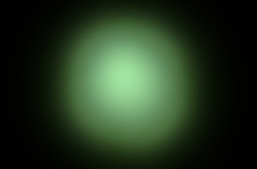 Beautiful abstract illustration with green luminous sphere on black background.