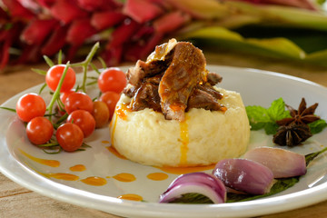 Gastronomy. Traditional food from northeastern Brazil. Goat meat with manioc puree