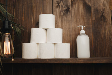 Quarantine panic: a lot of toilet paper and soap on the shelf