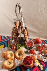 Dishes of Uzbek cuisine on a red background and beautiful decoration.