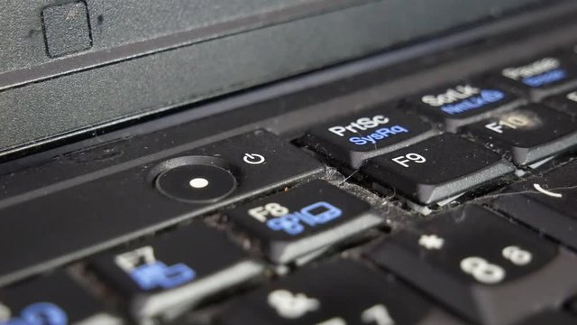 Laptop power button. Wi-Fi and computer drive indicators