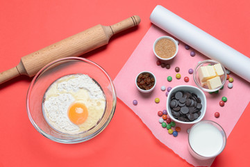 Ingredients for preparing bakery on color background