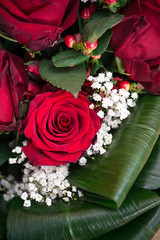 detail of colored fresh roses bouquet. Wedding ceremony