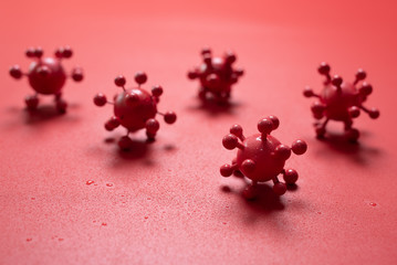 Coronavirus outbreak in 2019,Flu COVID-19 virus cell on red background,dangerous flu,top view