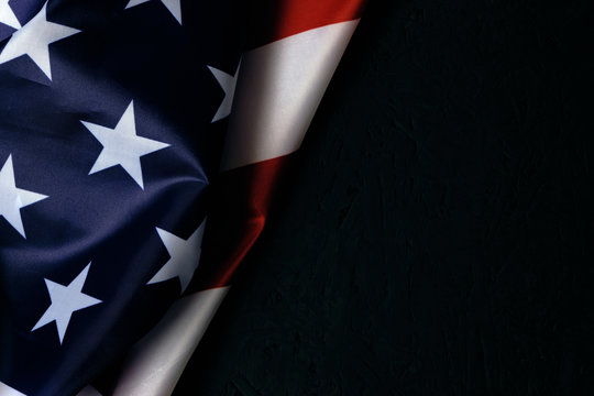 Flag of the United States of America with a place for the inscription.USA black background.