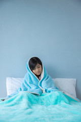sick girl in bed isolated by pandemic in coronavirus in mexico