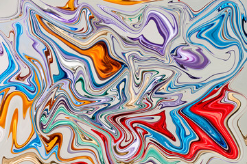 Stains of paint on the water, perfect for a background, a graphic image