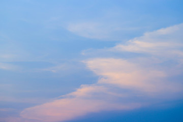 Dramatic blue sky background. Picturesque colorful clouds lit by sunlight. Vast sky landscape panoramic scene - colorful.