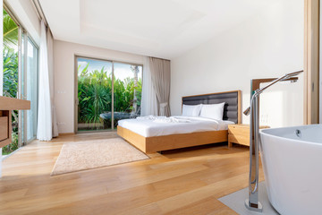 Interior design of bedroom with bathtub in villa, house, home, condo and apartment
