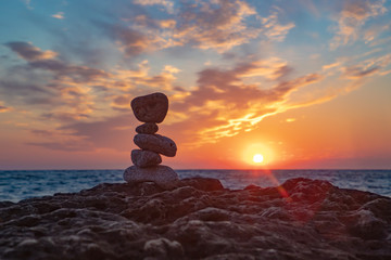 Zen concept. Sunset. The object of the stones on the beach at sunset.  Relax & Meditation. Zen stones