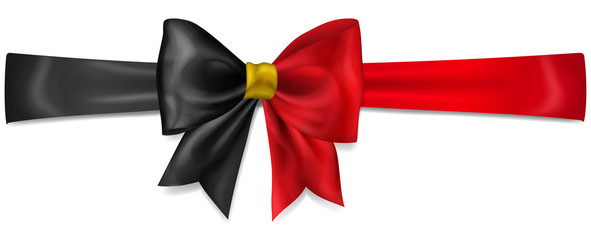 Big bow made of ribbon in Belgium flag colors with shadow on white background