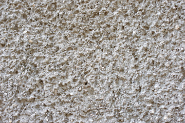 Modern fade soft grey paint limestone material texture background in flat white light concrete stone fortress wall paper.