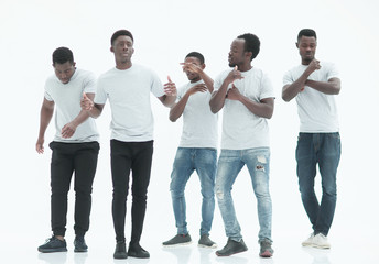 Obraz premium in full growth. group of casual guys in white t-shirts