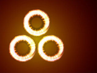 Three shiny circle on dark background. Motion light with spakle and beams. Vector.