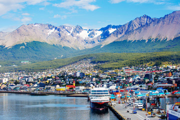 Ushuaia, Argentina, city view from the sea.
 Ushuaia is the southernmost city in Argentina (and...
