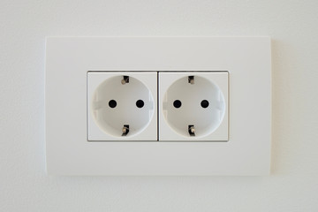 The socket twin double white EU standard with grounding.