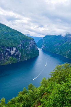 Landscape of Geirangerfjord and Seven Sisters Waterfall near small village of Geiranger. View from Eagles Road viewpoint. Norway. © jana_janina