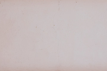 Texture of old pink cement wall with crack background