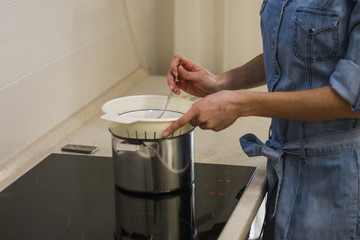 cooks in the kitchen at home