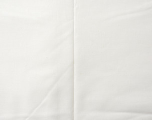 white cotton fabric folded, full frame, textile for sewing clothes and bedding