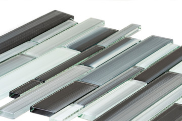 Backsplash of glass mosaic tiles against white
