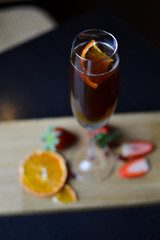 Coffee sparkling wine with oranges