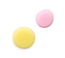 Spilled shower gels on white background