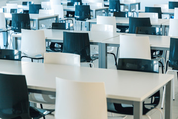 Black and white chairs on canteen. Modern meeting room.