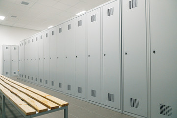 White lockers in a changing room - obrazy, fototapety, plakaty