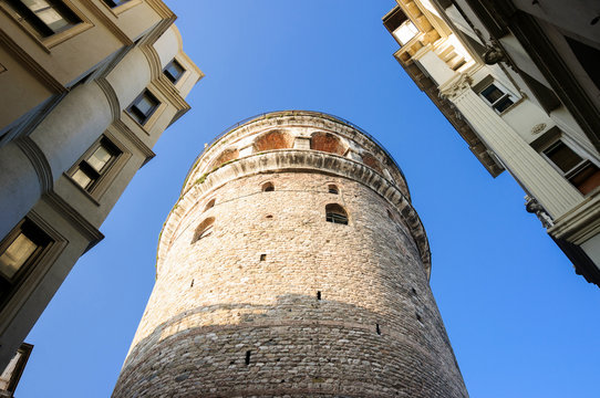 View of the Galata tower between two houses.