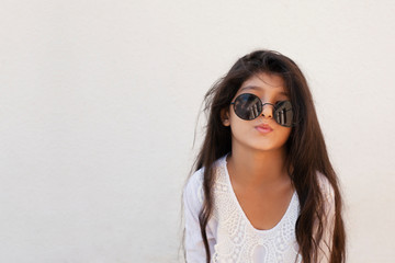 Summer girl. Happy pre-teen girl having fun. Happy childhood